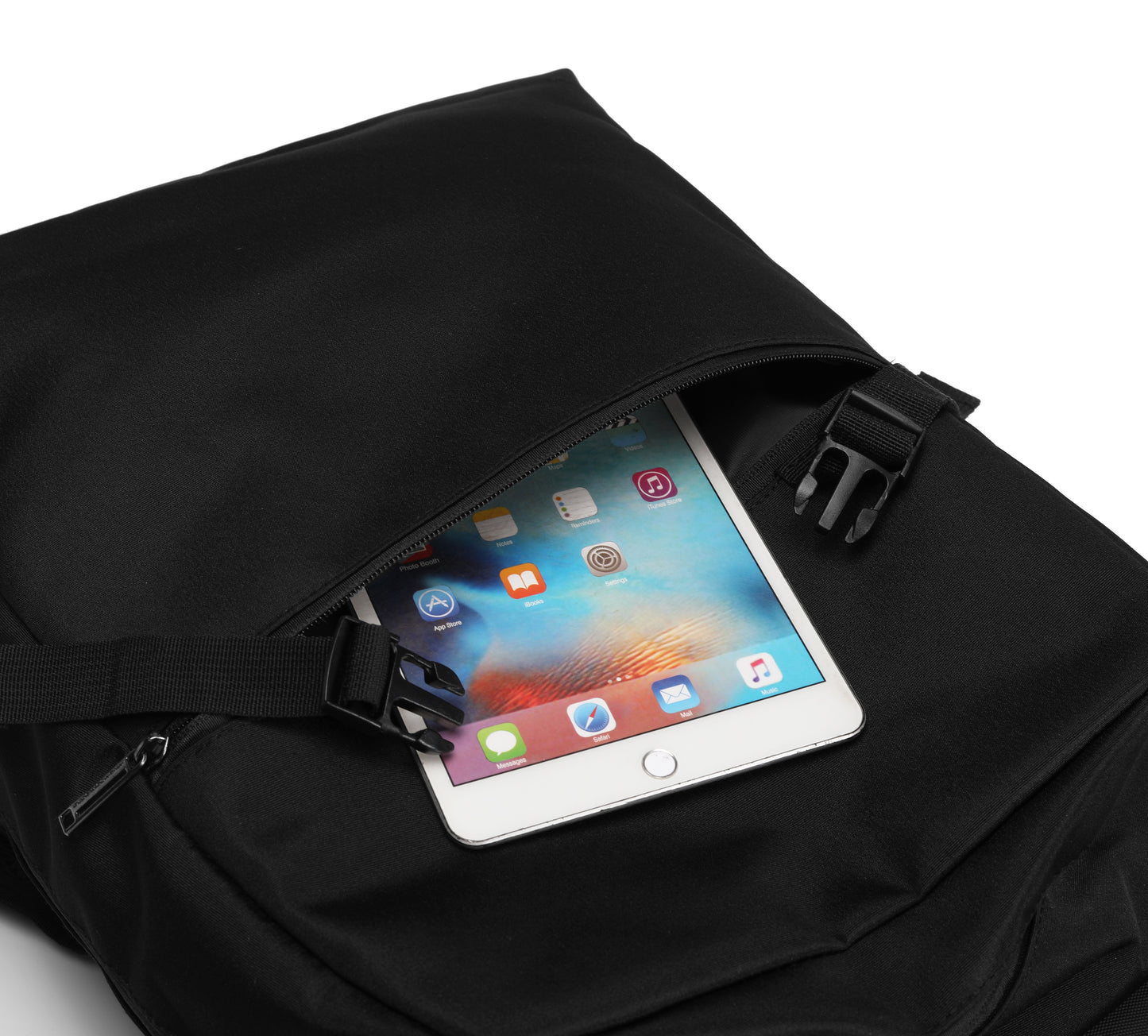 Black backpack with a tablet inside on a white background