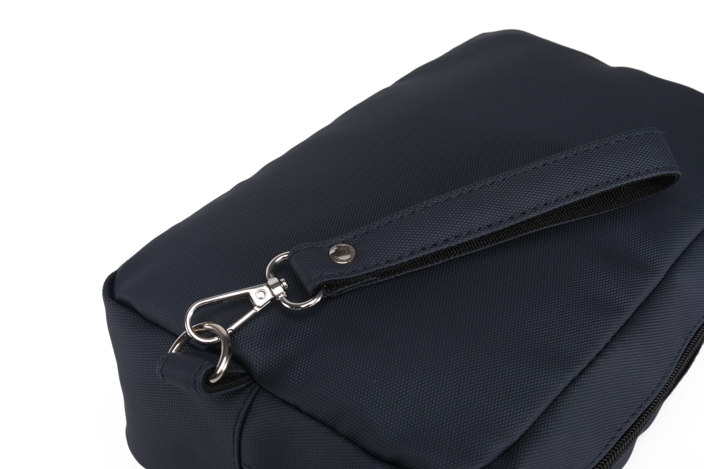Navy blue bag with a silver clasp on a white background