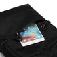 Black backpack with a tablet inside on a white background