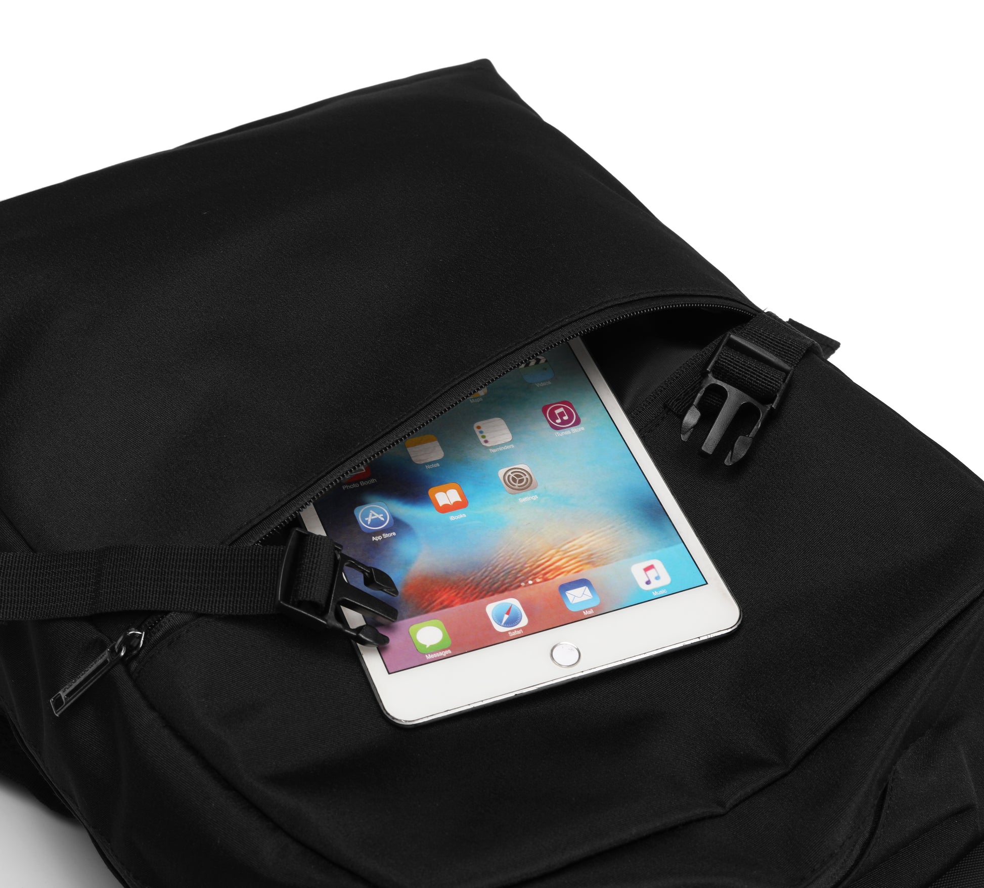 Black backpack with a tablet inside on a white background