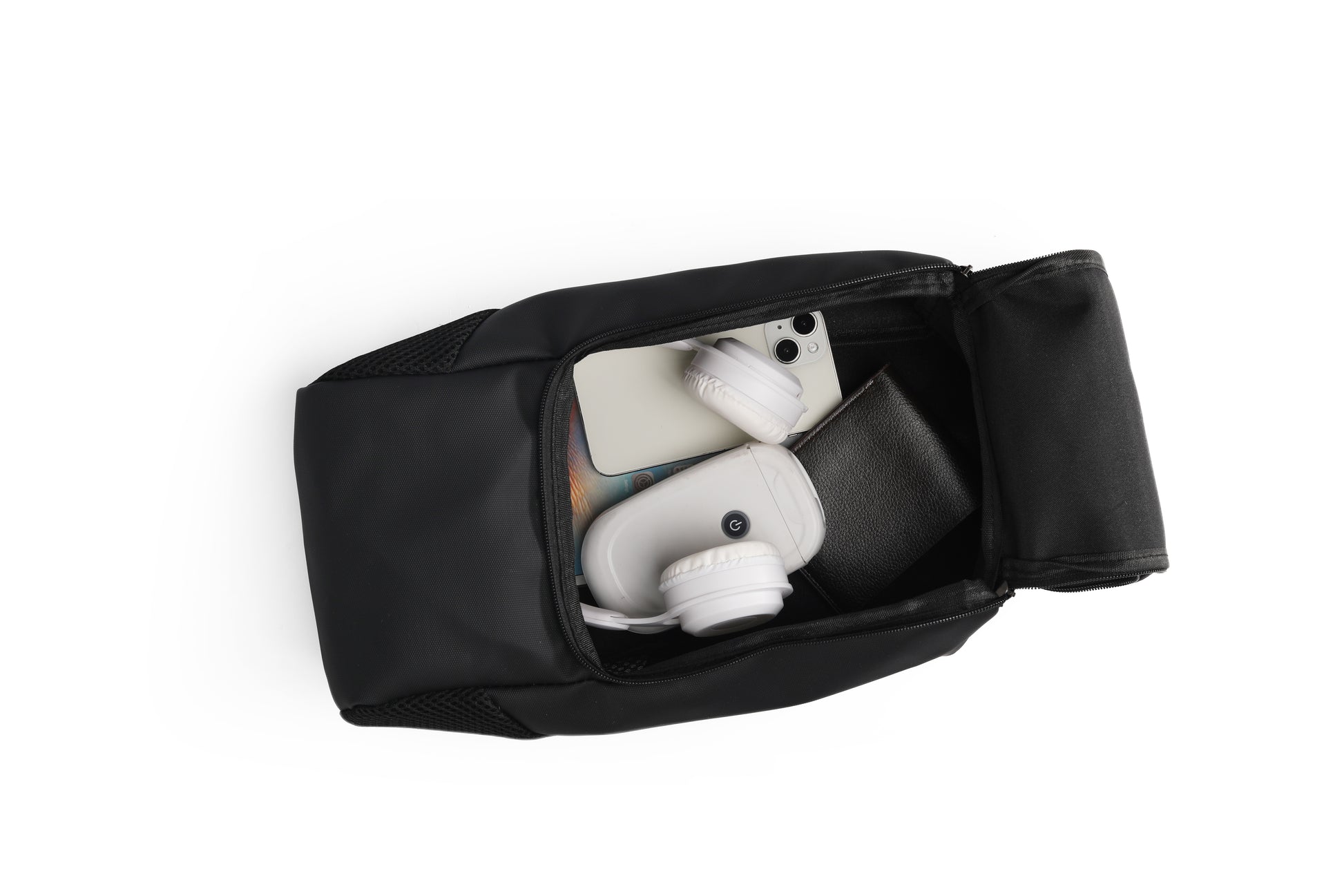 Black travel pouch with white earbuds inside on a white background