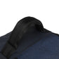 Close-up of a blue bag with a black strap on a white background